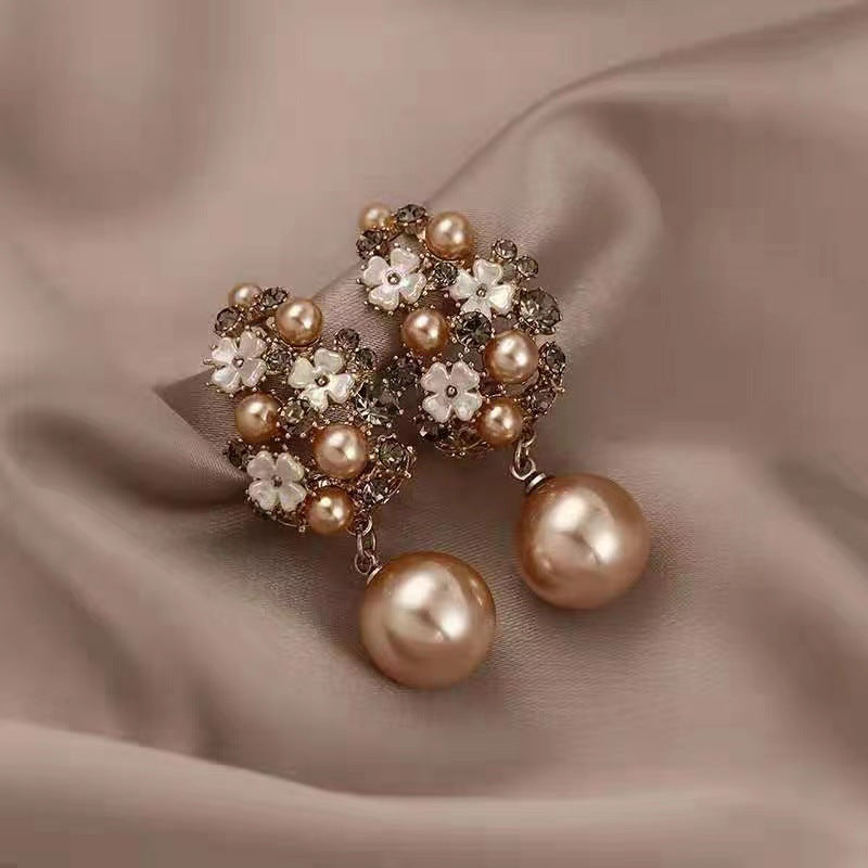 Elegante oorbellen met bloemenkralen